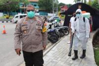 Polisi Semprot Disinfektan di Gereja-Gereja di Kota Kupang