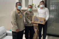 Polda NTT dapat Bantuan Ribuan Hydro Oxy Mouth Freshener Spray 