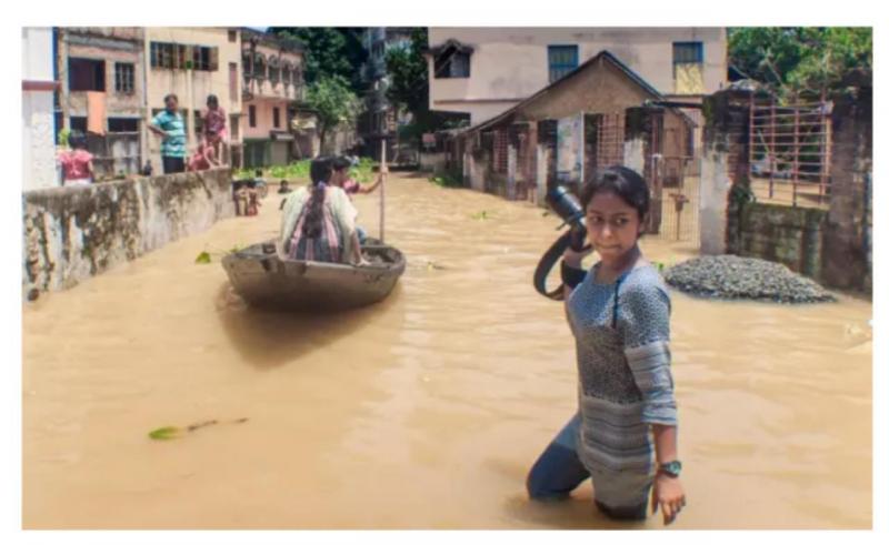 Jurnalis meliput bencana banjir 